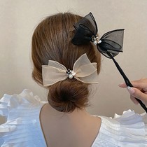 Pearl bow hair artifact female lazy meatball head twist clip French 2021 new hair coil