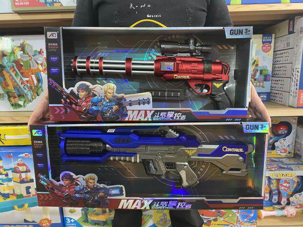 Dynamic shooting children's electric sound and light toy gun Gatling submachine gun MAX Douluo controller glare sound effect