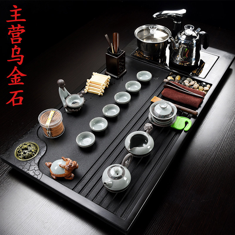 Three tea whole natural black gold stone tea tray Household automatic four-in-one Kung Fu tea set Office stone tea table