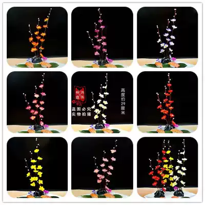 Hotel sashimi seafood plate decorated with plum blossom volcanic stone sushi cuisine around the edge decorated with hotel plate decoration creative flowers and plants