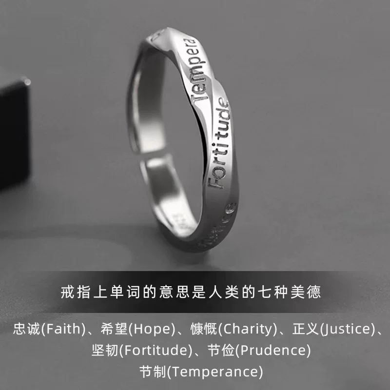 Men's ring with letters for students, on index finger