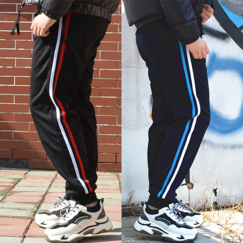 Two bars of push-beaten pupils in school uniform trousers in spring and summer thin blue closing school pants