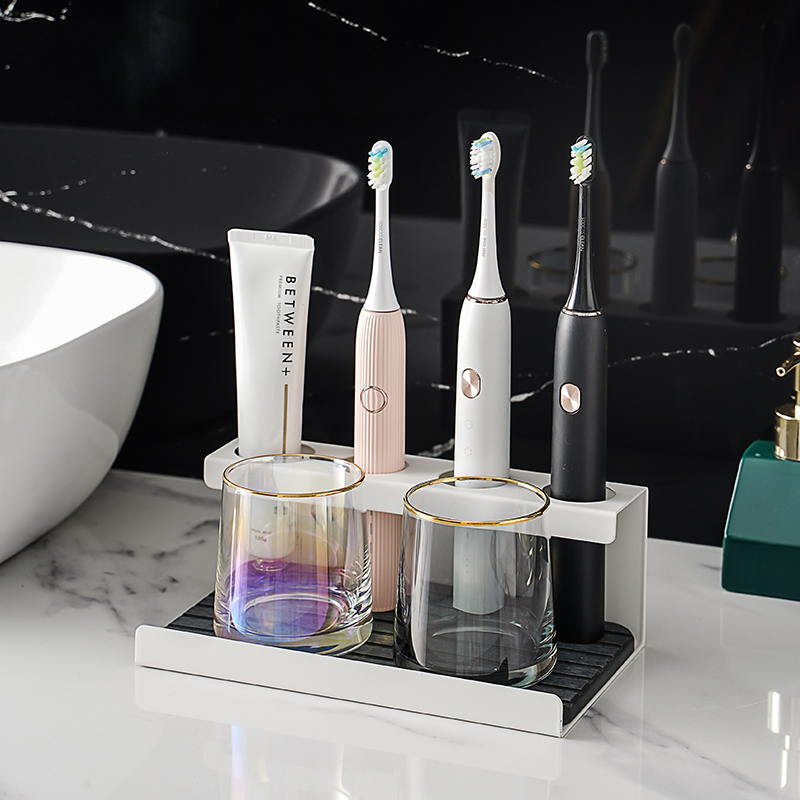 Punch-free electric toothbrush rack minimalist home dressing room suction wall-mounted accommodating swing table multifunction suit
