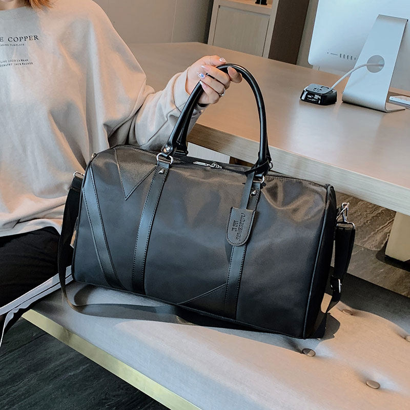 Simple travel bag men's business trip short-distance luggage bag women's hand luggage large-capacity waterproof foldable travel bag