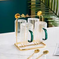 Зеленая чашка 4 стакана, 4 ложки, 1 бабочка (маленькая золотая рама) Общая сумка