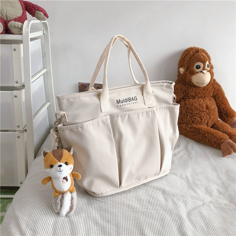 Japan mommy baby bag 2021 new net red multifunction large capacity hand single shoulder bag nylon slanted satchel