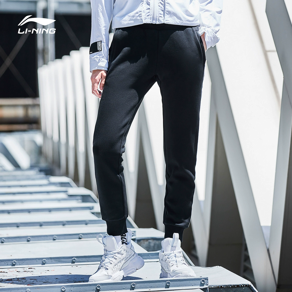 Li Ning CF Yaotian Tianmu mồ hôi tuần lễ thời trang catwalk mẫu nữ mới đóng cửa giản dị in quần thể thao nữ - Quần thể thao