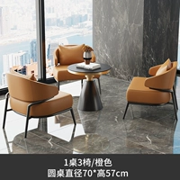 Один стол и три стула оранжевого цвета [стол круглый 70*57]