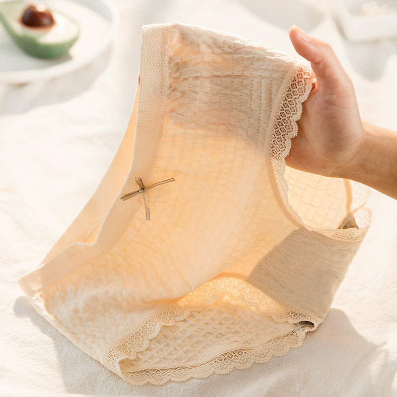 Cotton underwear women's summer thin hip-lifting antibacterial breathable seamless modal cotton crotch girl mid-waist briefs