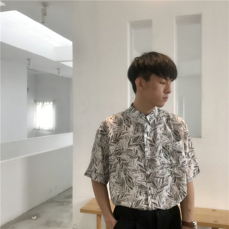 2020 summer holiday wind flower shirt short-sleeved men's loose ins wind leaf pattern casual Korean shirt men and women