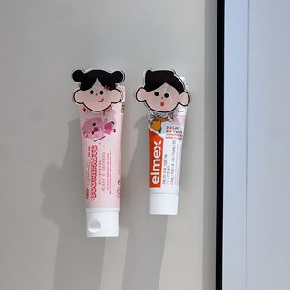 可爱牙膏置物架亚克力挤牙膏夹卫生间浴室壁挂洗面奶收纳神器