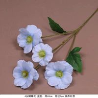 Флуоресцентные зеленые 4 цветы бабочки небо голубой