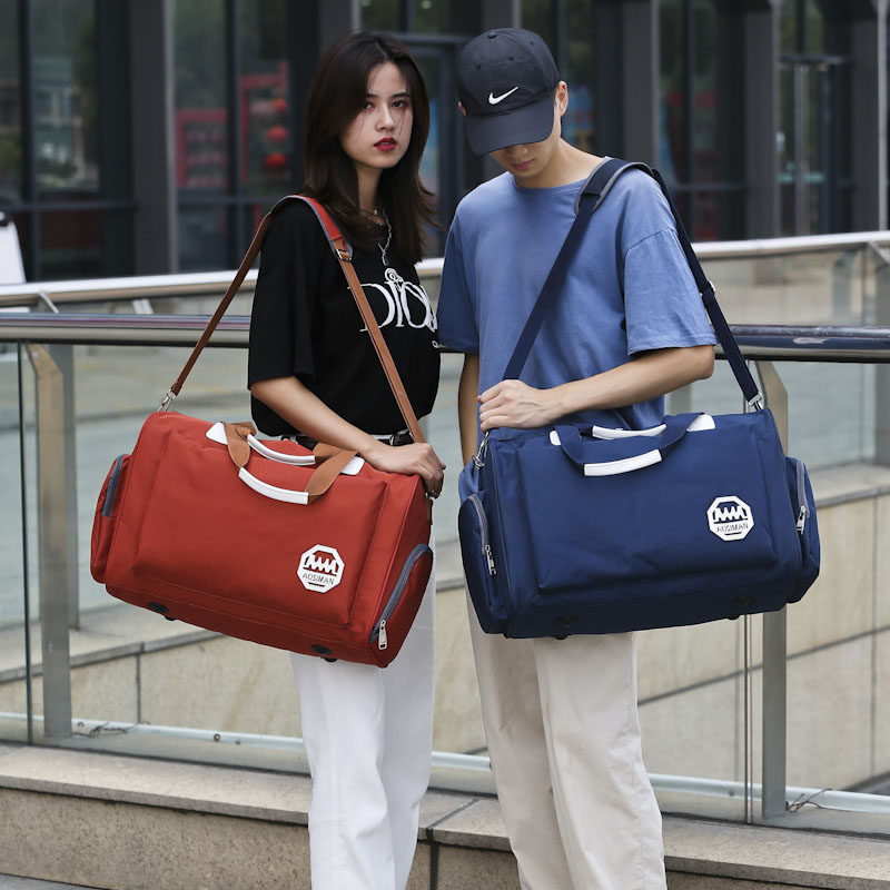 Large-capacity portable travel bag female Korean short-distance travel bag shoulder luggage bag can carry clothes luggage bag