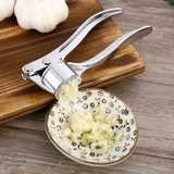 Чесночный артефакт кухня прессованная чесночная артефакт дома чесночная грязь вручную домнитесь от чеснока с чесноком и чесноком, прессованным чесноком, чесноком