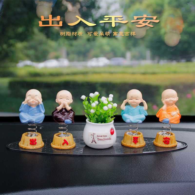 Net red four not small monk car parts in car in car console shake head two cars monk car high-end jewelry large