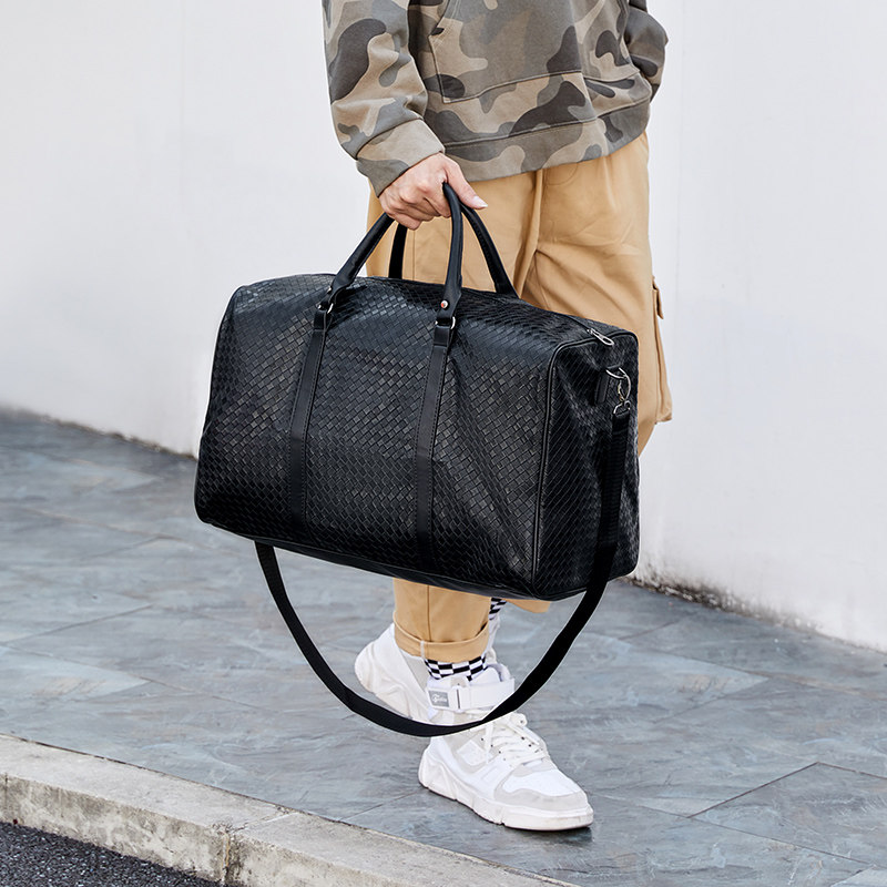 Handheld Travel Pack Men's New Pu Woven Travel Travel Travel Large Capacity Boarding Package Short Light Luggage Package
