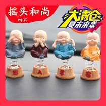 Creative car ornaments car shaking head little monk safe and cute car high-end car interior decoration supplies