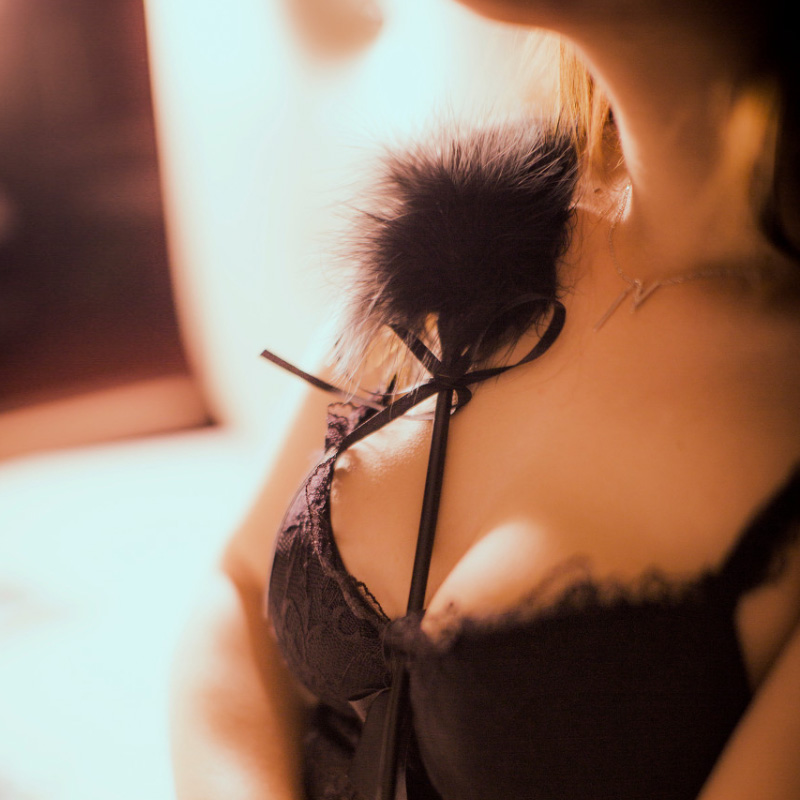 Women with passion flirtation feathers tease stick ass fun sex goods couples passion bed SM tools