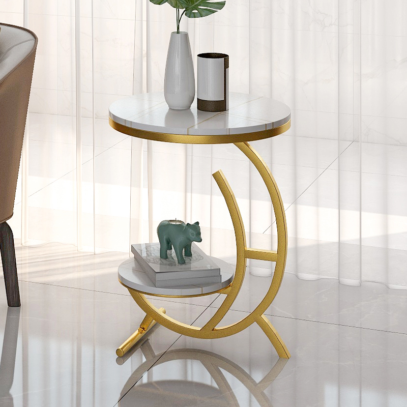 The side cabinet next to the sofa is a few light luxury new creative movable personality bedside table net red ins wind small circle