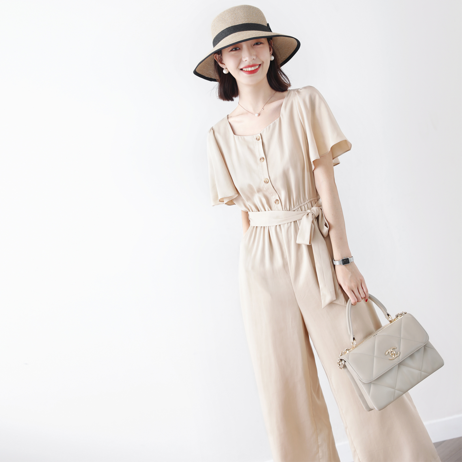 Dituton light luxury Japanese 2021 summer new fashionable high-end women's clothing square collar lotus leaf sleeve solid color jumpsuit women