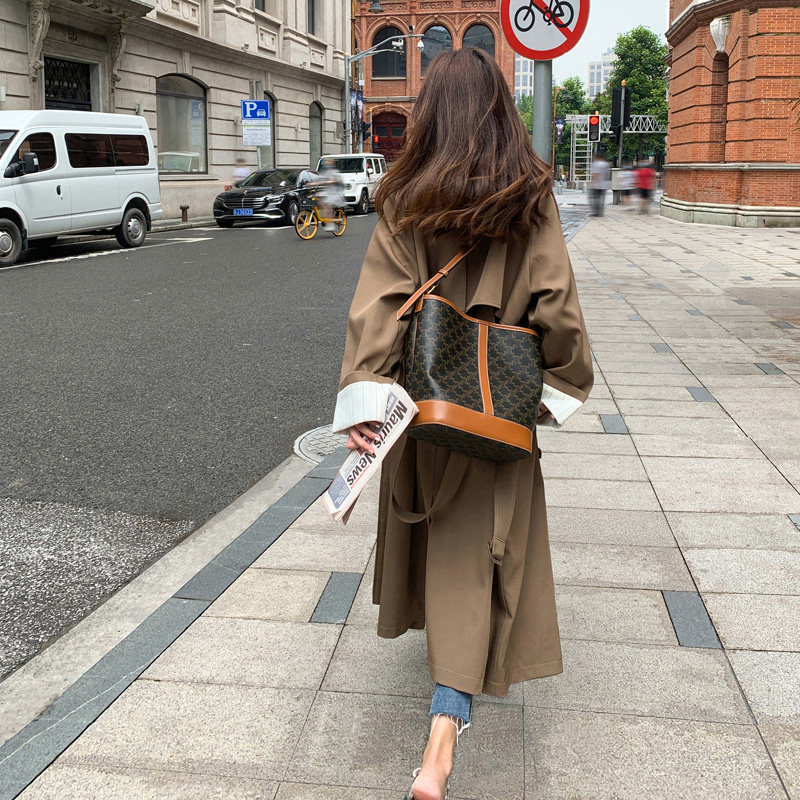 Korean version chic temperament windbreaker women's mid-length version 2022 spring and autumn new loose waist design sense sleeves jacket