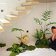 Simulated green plant landscaping combination, indoor landscape plant placement, fake flowers, floor-to-ceiling windows, high-end decoration shopping mall