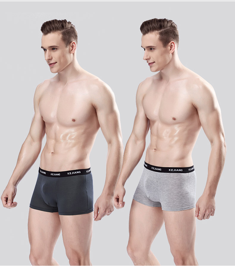 4 hộp quà tặng nam đồ lót nam boxer eo trung thanh niên lỏng thể thao thoáng khí đơn giản bốn chân đầu triều