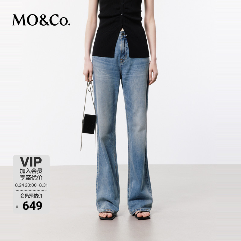 Moco Jeans with a Washed and Distressed Classic Blue Tailored Low-Rise Flared Floor-Length Cotton Denim Jeans by Mocon
