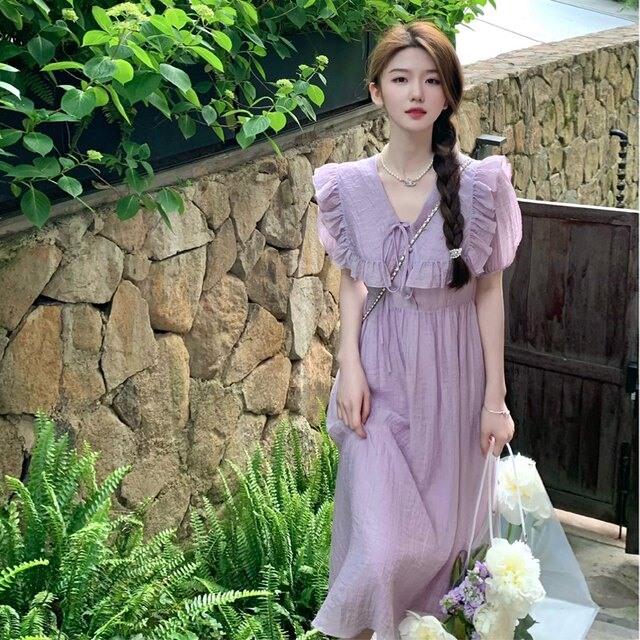 Purple dress female summer 2022 new temperament French v-neck fairy skirt stunning skirt high-end sense royal sister