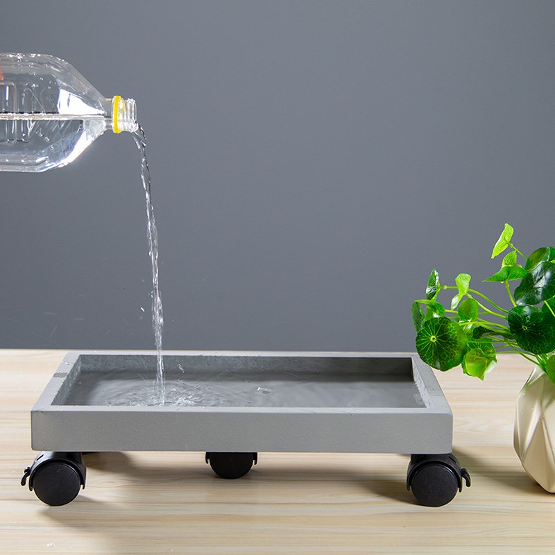 Flowerpot towing wheel anti leakage tray was dark after the spray dragging pelvic floor with this tray was potted tray was the base of green plant