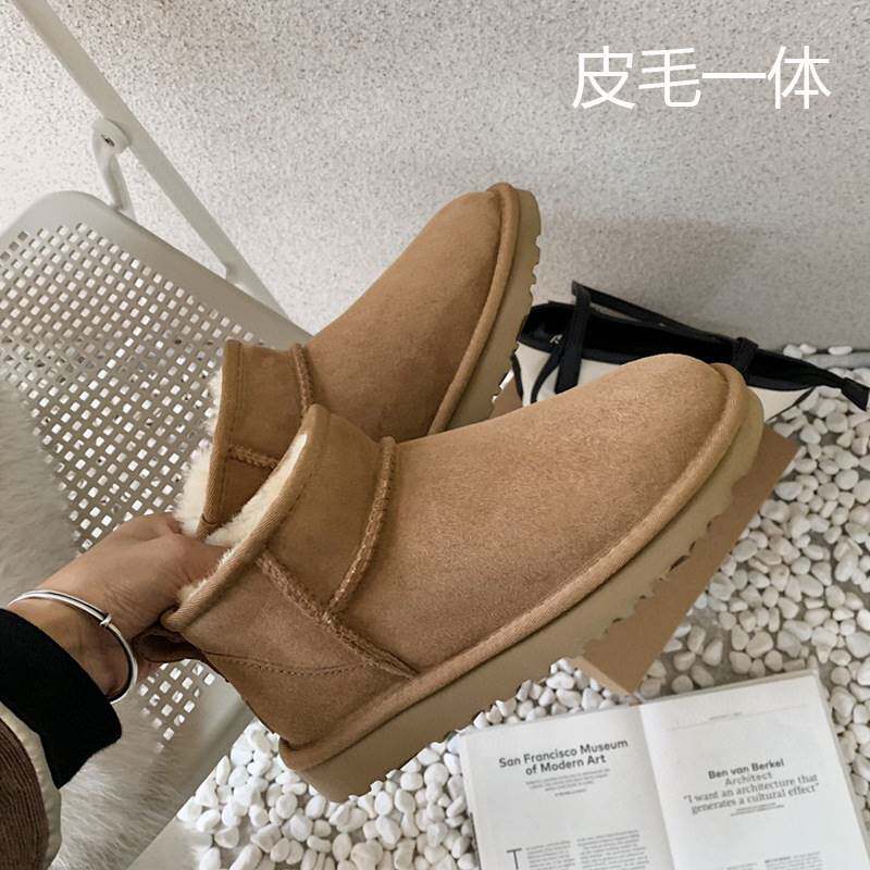 Winter leather snow boots women's shoes autumn and winter tide warm plus velvet leather short tube non-slip flat wool rubber bottom cotton boots