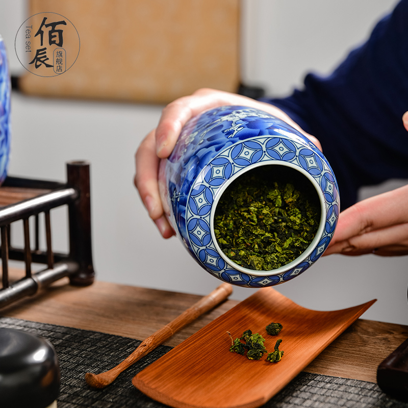Retro number in blue and white porcelain tea pot of ceramic seal pot black tea, green tea moisture storage tank storage POTS with gift box