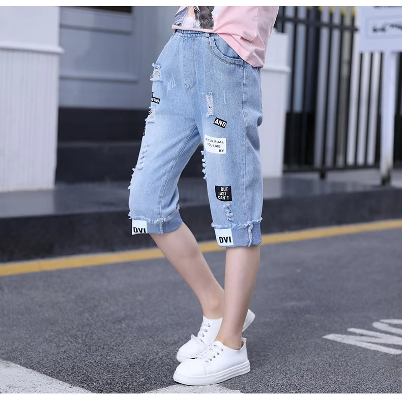 Quần dài denim bé gái, quần 7 điểm mỏng mùa hè, quần short trẻ em cỡ lớn, quần thời trang phong cách hàn quốc, quần ngoài trẻ em - Quần jean