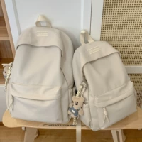 Белый большой кулон в виде белого медведя с цветной веревкой