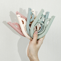 Portable travel Net red folding hanger travel portable drying hanger shaking sound magic hanger multifunctional hanger