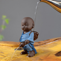 Shou Tao people purple sand urine children spray water tea pet ornaments boutique can raise creative little monk tea boy tea accessories