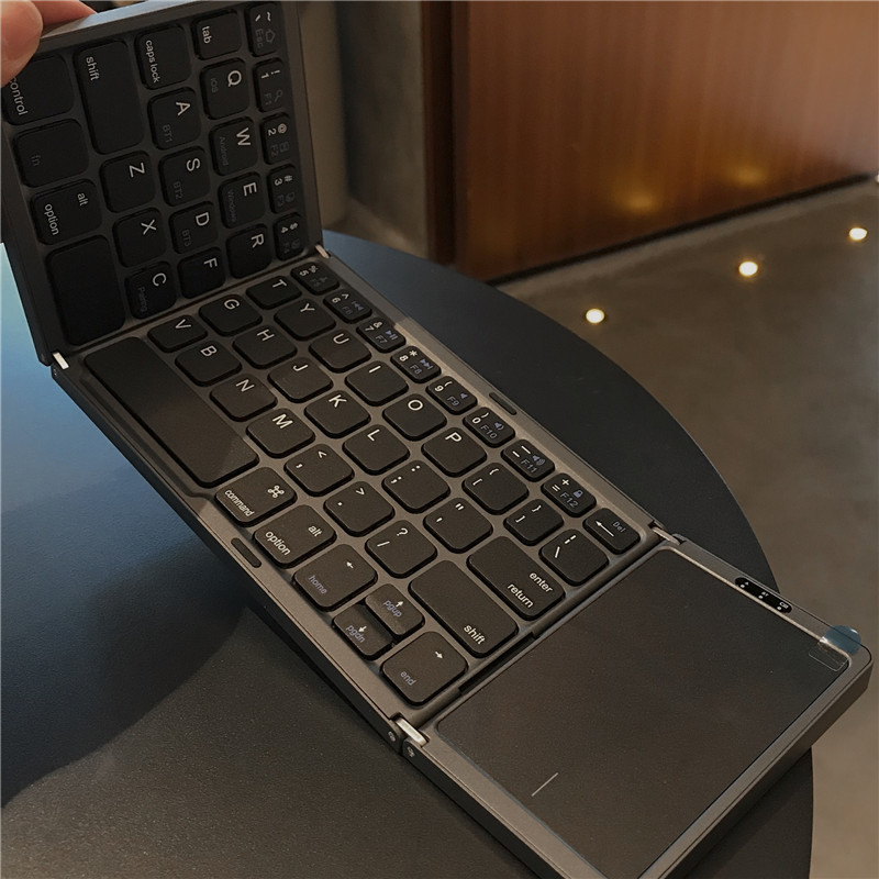 Bluetooth Keyboard 70% off in iPad Wireless Keyboard Ultra-Thin Portable Suitable for Apple Phones Universal External Keyboard Can Connect to Tablets, Macs, Laptops with Touchpad Virtual Mouse