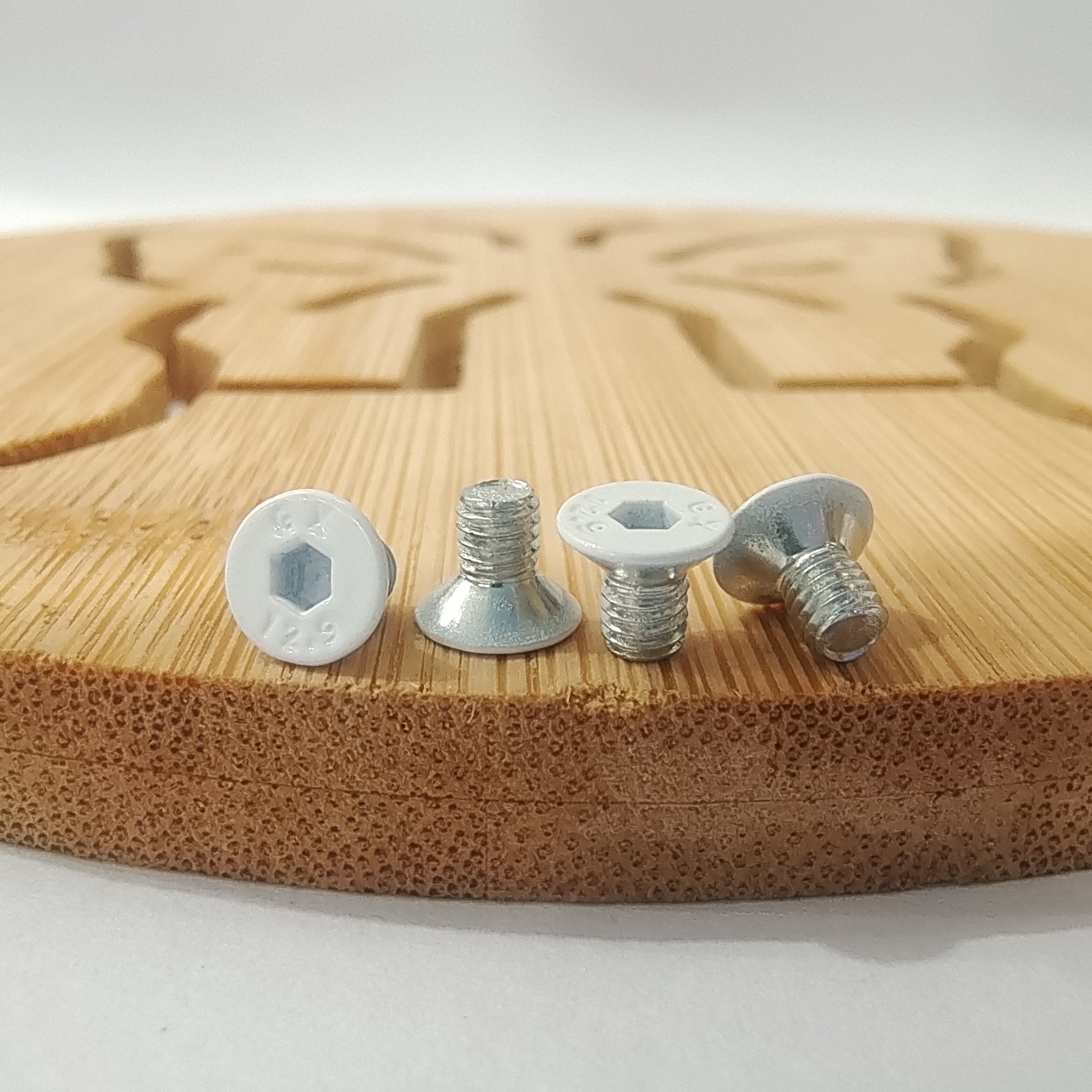 DIN 7991 factory for 10 9 level flat head sunk hexagonal tooth screw white arbitrary head paint