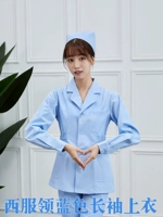 Женский костюм привел голубое платье