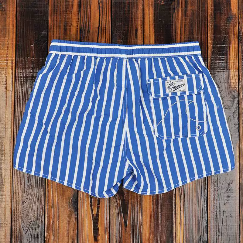 Quần đi biển nam đi biển kỳ nghỉ trắng quần short sọc trắng quần short bơi lội suối nước nóng quần ba phần tư có lót - Quần bãi biển