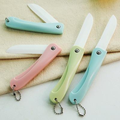 . Small folding fruit knife knife Small household multi - functional Small ceramic portable with a express the type