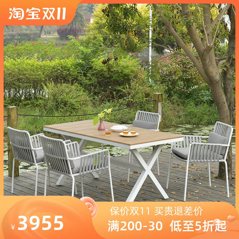 Outdoor table and chair courtyard high-end outdoor rattan chair table and chair villa garden balcony outside the net red rattan chair table and chair combination