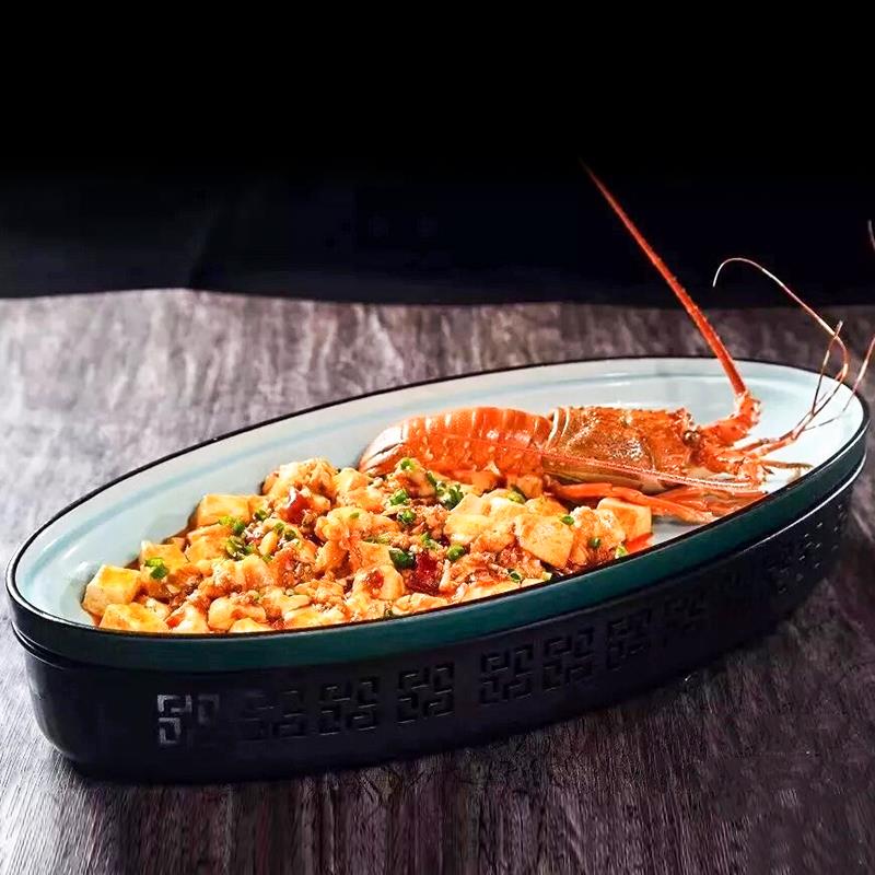 New Chinese style oval ceramic steamed fish plate of restoring ancient ways, wrought iron large thermal heating furnace operation of tableware bag in the mail