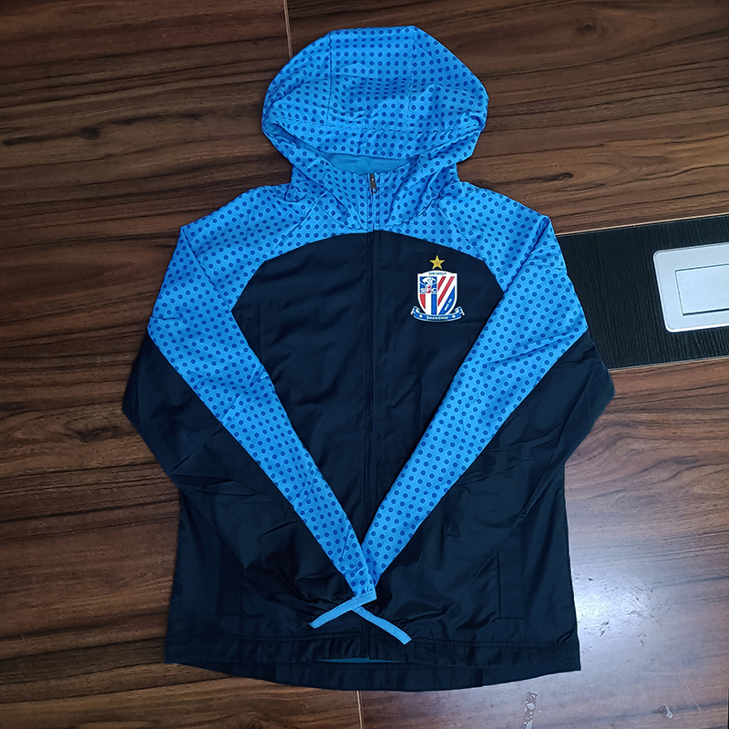 Shanghai Shenhua Style Rainoutwear Jacket Player Same Style Sports Travel Jacket 2024 Mid-Super Team Uniform Woven Thin Windbreaker