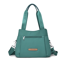 Синий цвет поздней волны с ремешком через плечо.