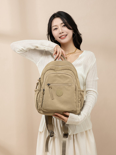 Sin cuero, tela pura, mochila ligera de nailon suave para mujer, mochila escolar para estudiantes de gran capacidad, mochila de moda de viaje