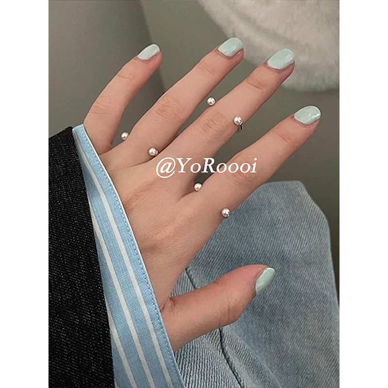 ЙоРуоюй корейский стиль серьги? Wait the input: "YoRoooi Korean style ins niche perforated opening silver round bead pearl joint ring personalized simple ring" This seems product title likely: