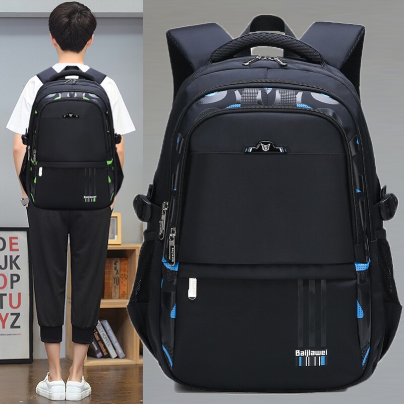 New junior high school student schoolbag boys large-capacity burden relief crest fashion primary school students four-five-six shoulder bag waterproof tide