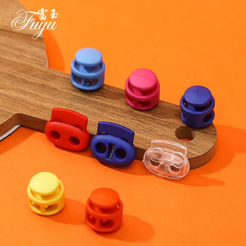 Spring tightens the needle tightly adjust the plastic suspension of the jacket wearing rope pig nose button to the rope