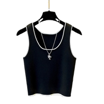 European style small fragrant knitted camisole for women with overalls and a short sports and funny vest underneath.